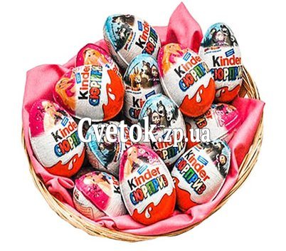 Eggs kinder surprise in the basket