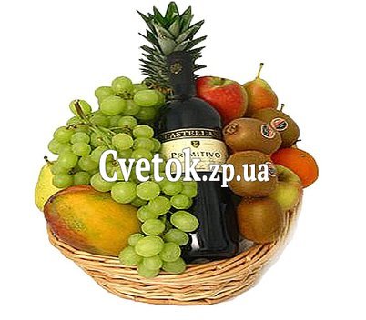 Фрукты и вино в корзине